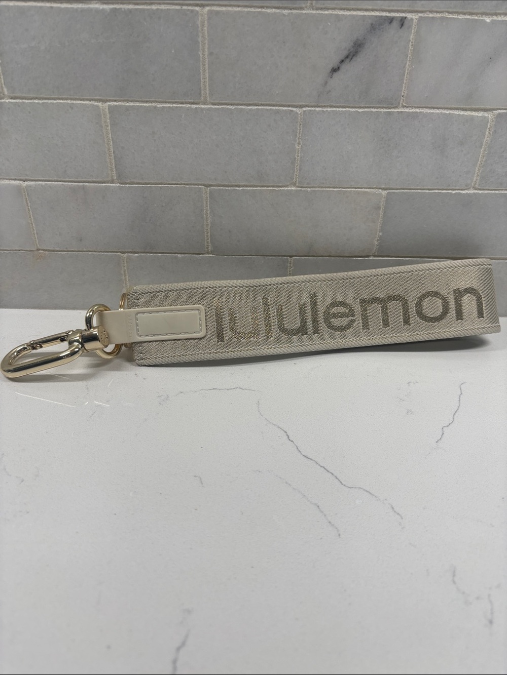 Lululemon Never Lost athletica Keychain – Light Beige